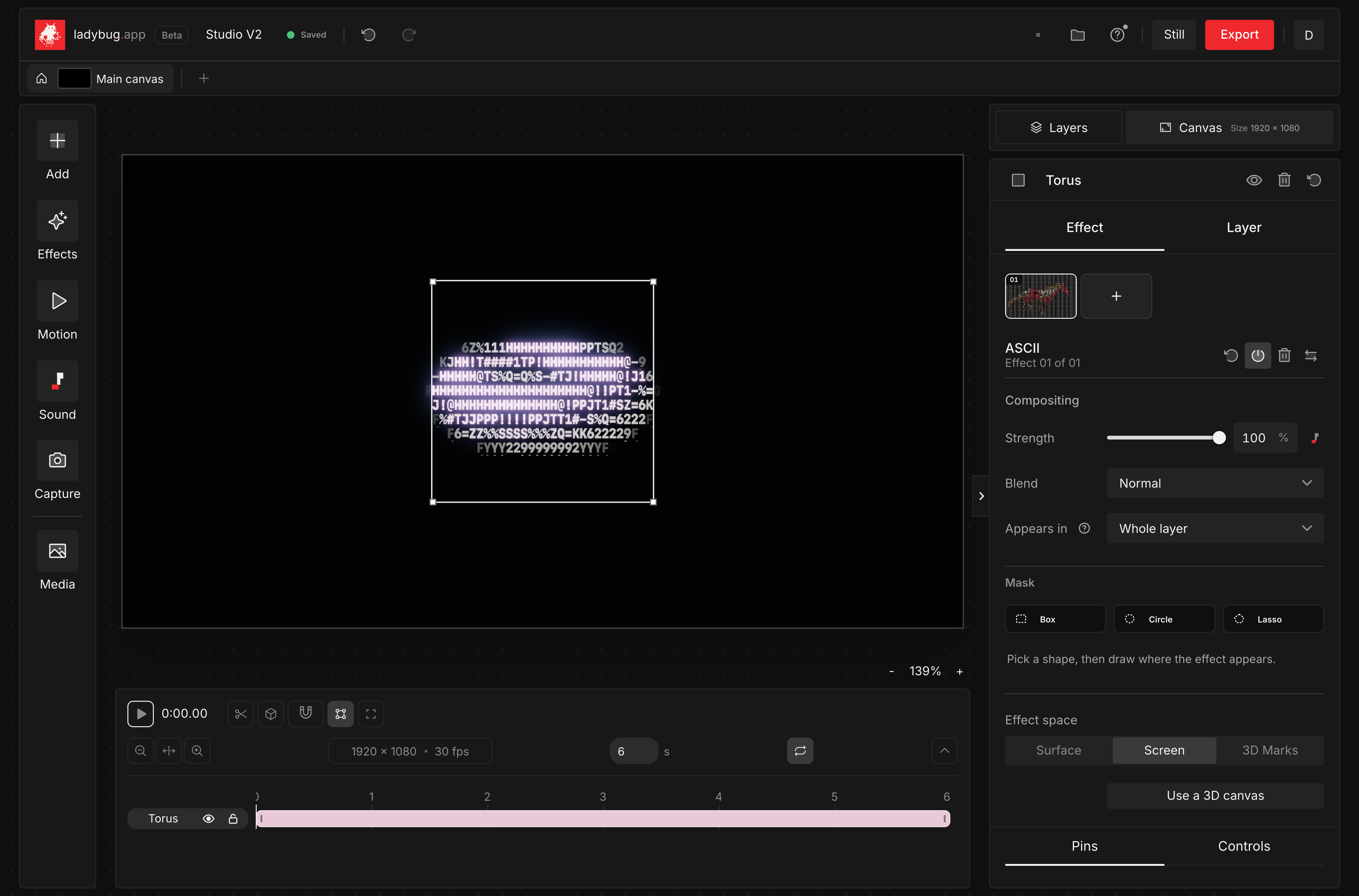 Studio V2 in dark mode with the Beta label, a 3D torus, timeline and effect inspector.